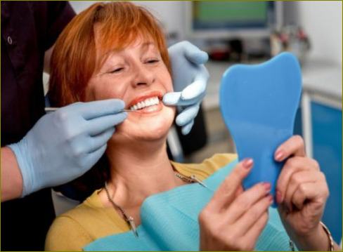 Zubní náhrady s implantáty